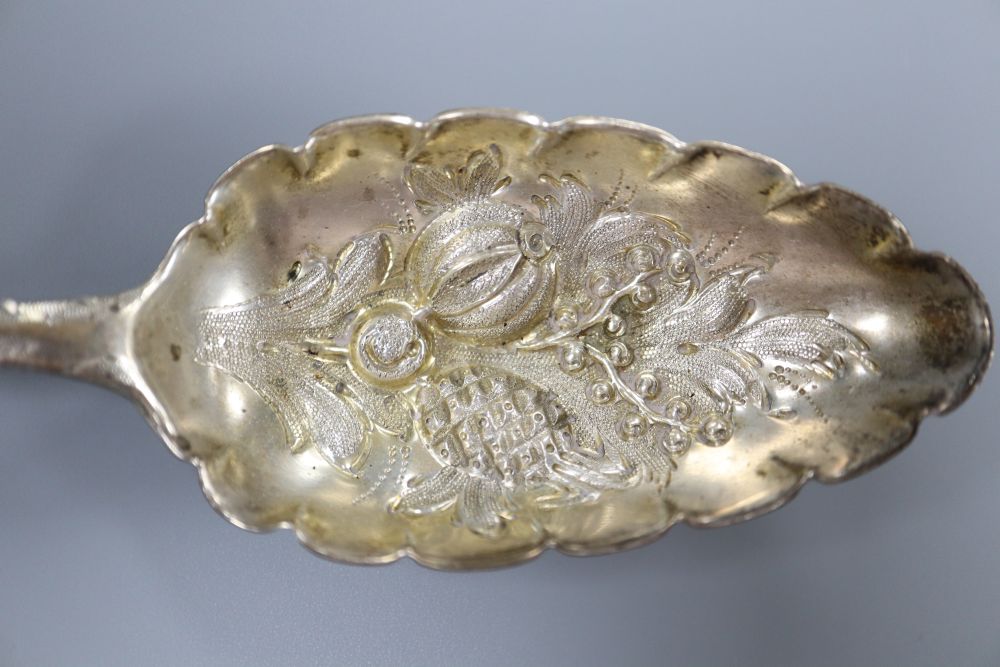 A pair of early George III silver Old English pattern berry spoon, Benjamin Cartwright II, London, 1764 & 4 others.